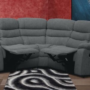 Sofá rinconera relax manual Luxor con asientos de espuma de densidad 28 kg y tapizado en microfibra color Marengo.