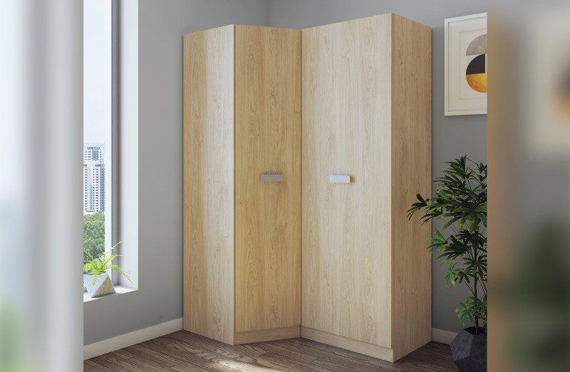 Armario Rincón Donald de melamina de primera calidad instalado en la esquina de una habitación, mostrando su distribución interior con estantes y cajonera.