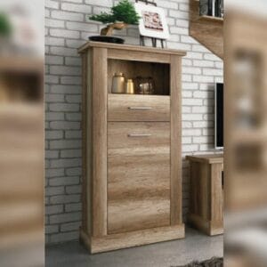Mueble bodeguero Chellén de diseño moderno con una puerta, un cajón y un hueco decorativo, ubicado en un salón.