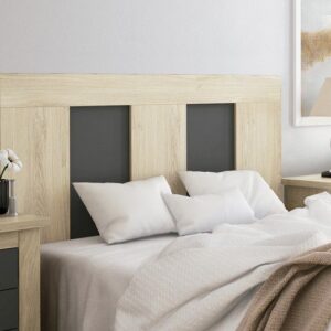 Vista frontal del cabecero de cama moderno Isaba de 160 cm en un dormitorio luminoso.