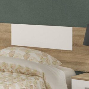 El cabecero juvenil Champion de madera en acabado cambria y blanco para un dormitorio moderno.