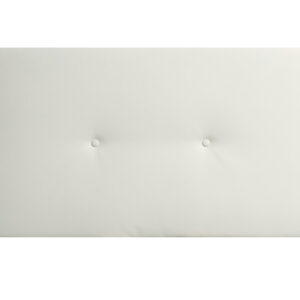 El cabecero juvenil tapizado Noah en color gris, apoyado sobre una cama con sábanas blancas.