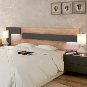 Elegante cabecero con luces Led Soto de estilo nórdico iluminando suavemente un dormitorio moderno.