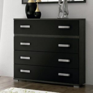 Cómoda Rambla de 4 cajones en color negro ceniza ubicada en un dormitorio de estilo contemporáneo.