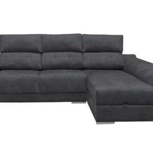 Sofá chaise longue Pirineos de diseño moderno en un salón luminoso, destacando sus respaldos reclinables y el arcón de almacenaje.