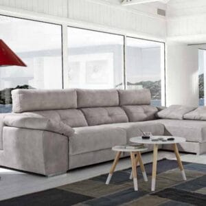 Cómodo sofá chaise longue Reina con respaldos reclinables y práctico arcón de almacenaje, perfecto para optimizar el espacio en salones modernos.