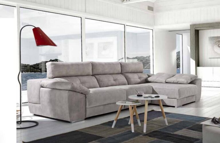 Cómodo sofá chaise longue Reina con respaldos reclinables y práctico arcón de almacenaje, perfecto para optimizar el espacio en salones modernos.