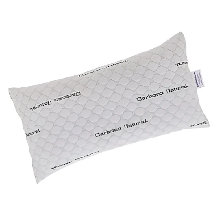 Almohada Viscocopos ergonómica sobre una cama bien hecha, destacando su textura transpirable de tejido 3D para un descanso óptimo.