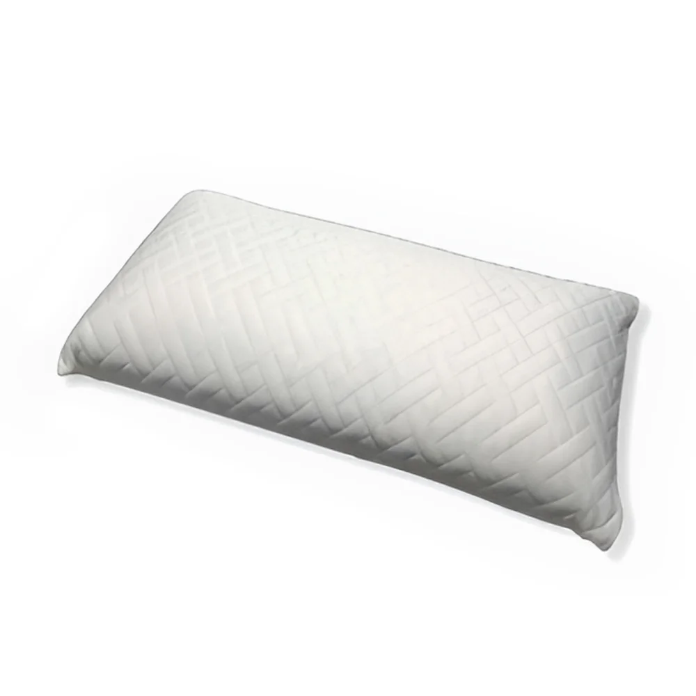Almohada viscoelástica Maxisoft blanca sobre una cama en un dormitorio, mostrando su grosor y textura mullida para un descanso superior.