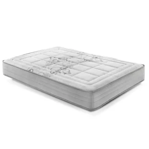 Colchón de espuma viscoelástica Venecia sobre un canapé en un dormitorio luminoso, destacando su tejido acolchado.