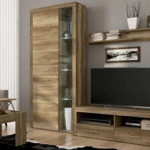 Composición de salón apilable Texas en color cañón, con mueble de TV, vitrina alta con luces LED y estante de pared.