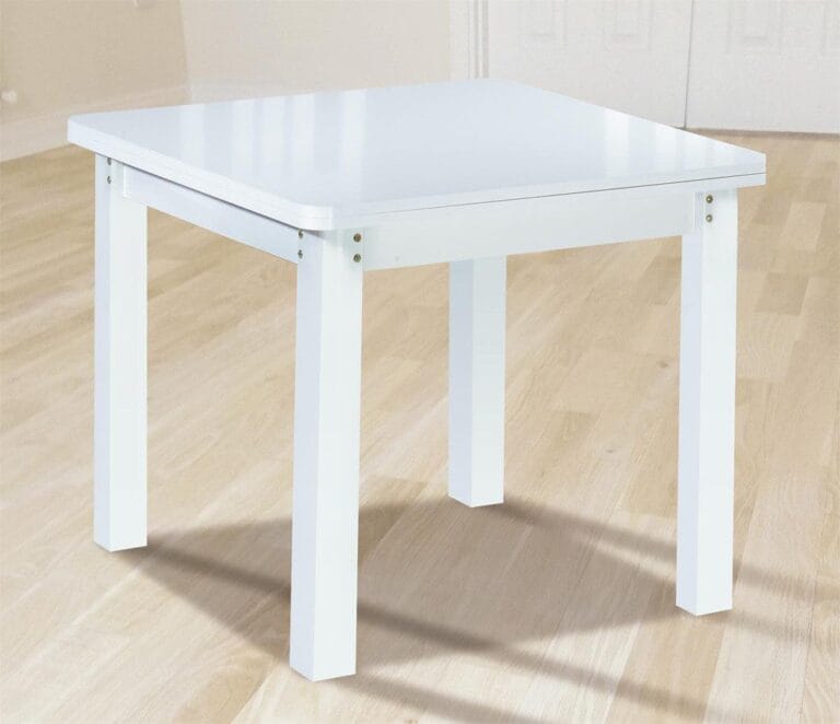 Mesa de comedor extensible modelo Zora con diseño tipo libro y tablero de melamina blanca, abierta para acoger hasta 8 personas en un comedor moderno y funcional.
