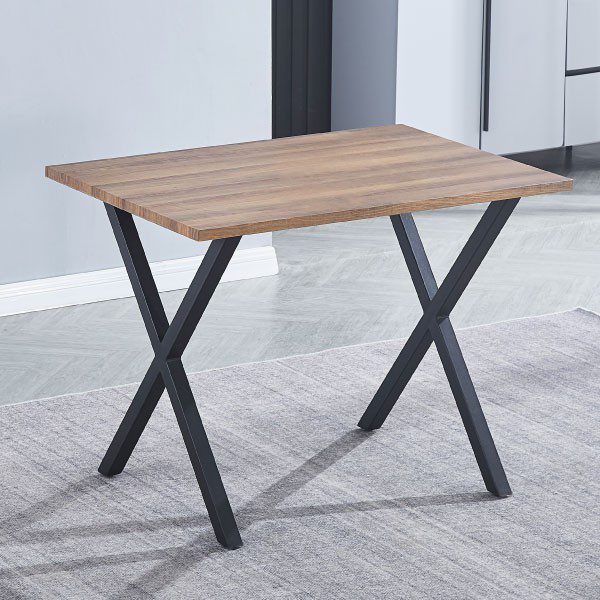 Mesa de comedor pequeña Videl fija de madera técnica de 100cm ideal para 4 personas, ambientada en un comedor moderno y funcional con sillas a juego y decoración luminosa.