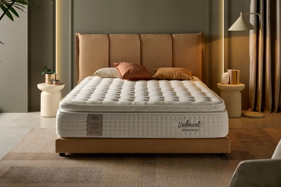 Colchones económicos que duran muchos años en un dormitorio moderno con cama preparada para un descanso duradero