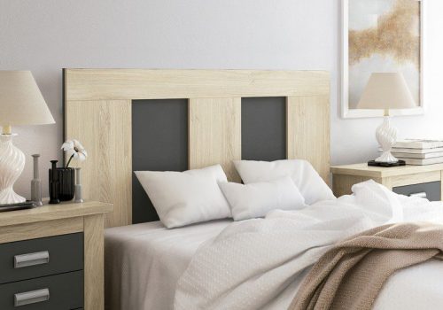 Vista frontal del cabecero de cama moderno Isaba de 160 cm en un dormitorio luminoso.