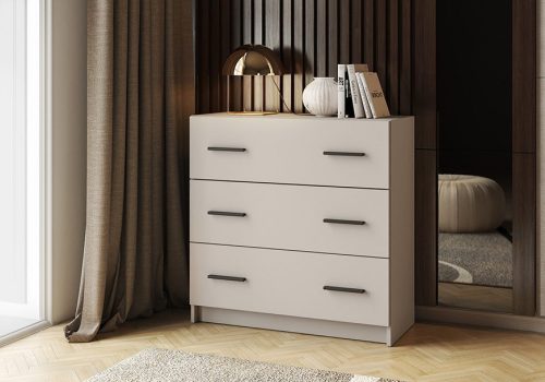 Cómoda de 3 cajones Aura en color beige con tiradores negros, perfecta para organizar el dormitorio con estilo.