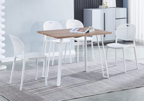 Conjunto de mesa rectangular Jansen blanca con tapa de MDF y patas metálicas, acompañado de 5 sillas apilables de polipropileno blanco en una cocina moderna y luminosa.