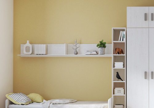 Estante de pared moderno modelo Donald de 202 cm en color Puccini instalado en un salón luminoso con libros y decoración.