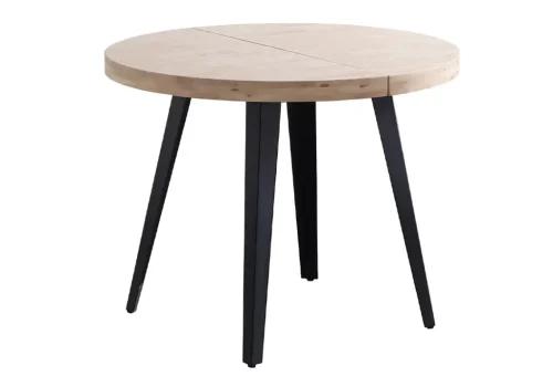 Mesa de comedor redonda extensible Berg, con tablero de madera maciza de roble y patas metálicas negras, en un elegante comedor moderno con 6-8 personas compartiendo una comida familiar animada.