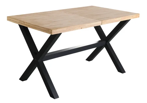 Mesa de comedor extensible de madera maciza de roble, con patas metálicas, desplegada para 10 personas en un comedor moderno y luminoso, perfecta para cenas familiares.