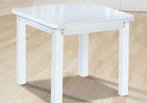 Mesa de comedor extensible modelo Zora con diseño tipo libro y tablero de melamina blanca, abierta para acoger hasta 8 personas en un comedor moderno y funcional.