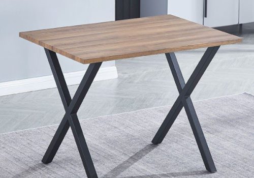Mesa de comedor pequeña Videl fija de madera técnica de 100cm ideal para 4 personas, ambientada en un comedor moderno y funcional con sillas a juego y decoración luminosa.