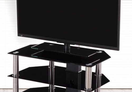 Mesa TV Manchester con tablero de cristal templado y patas de acero inoxidable.